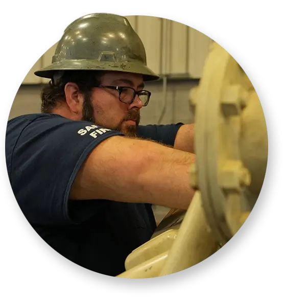A Devall Diesel engineer tightening a pipe